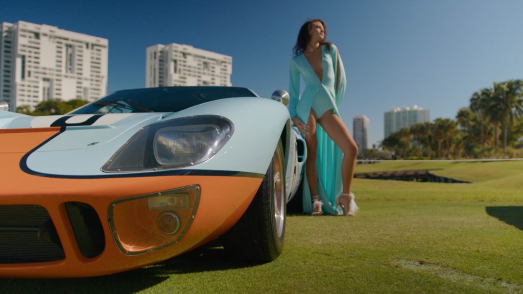 model posing next to ford gt