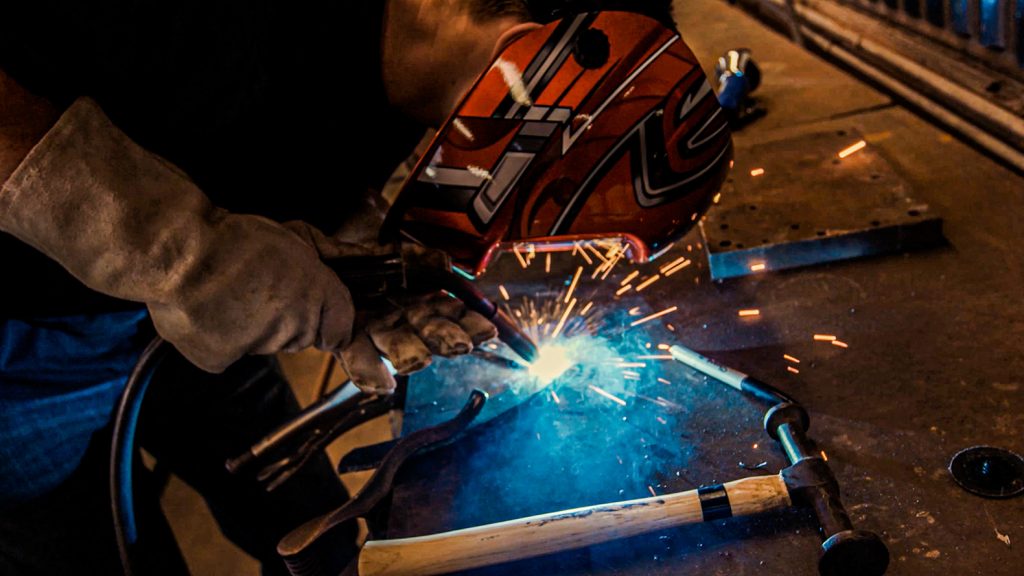 The Creative Workshop, close-up still of welding process.